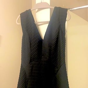 Black ripped and form fitting evening dress